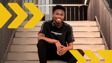 Engineering student sitting on the stairs