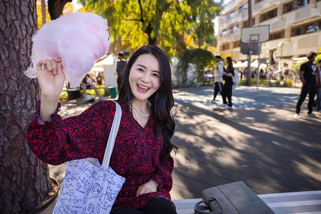 girl student enjoying in food in college