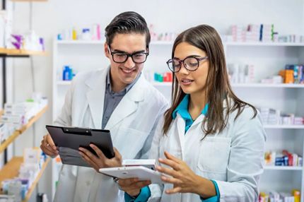 Male and female students in the lab