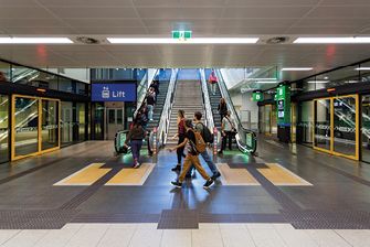 Students walking in metro station