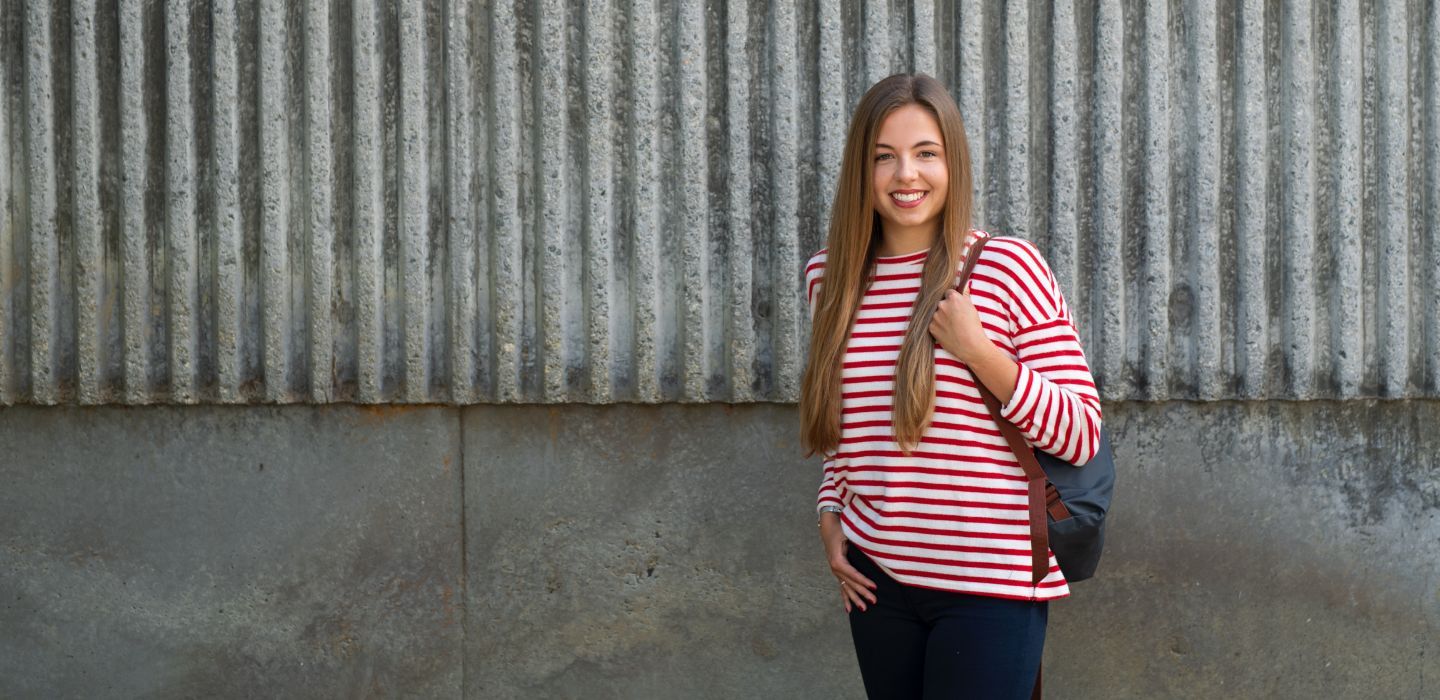 Campus female holding bag