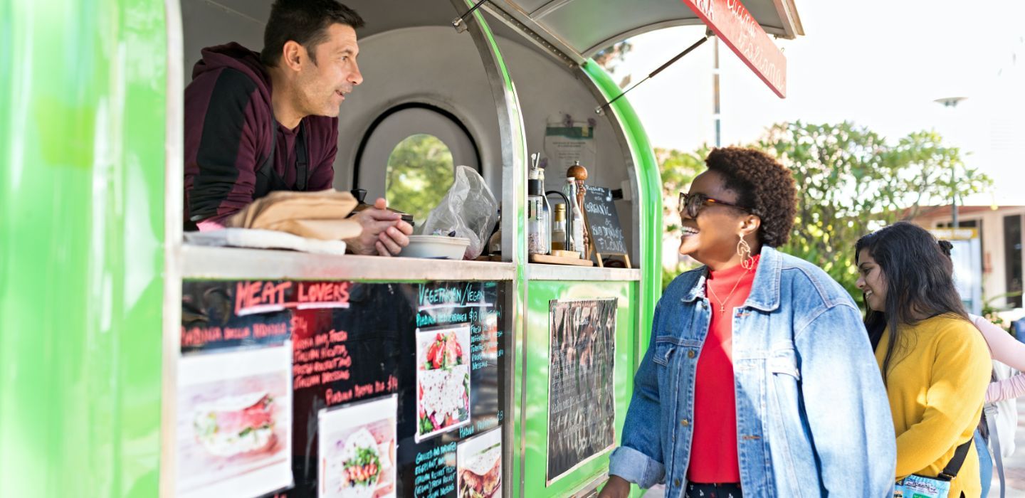 Campus female ordering food at food truck