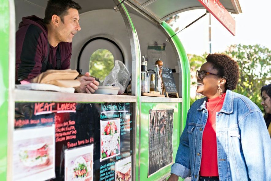 Campus female ordering food at food truck