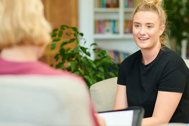 Campus female talking to therapist