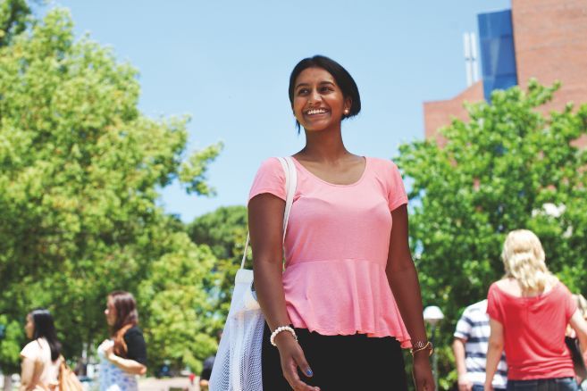 Campus female walking outside