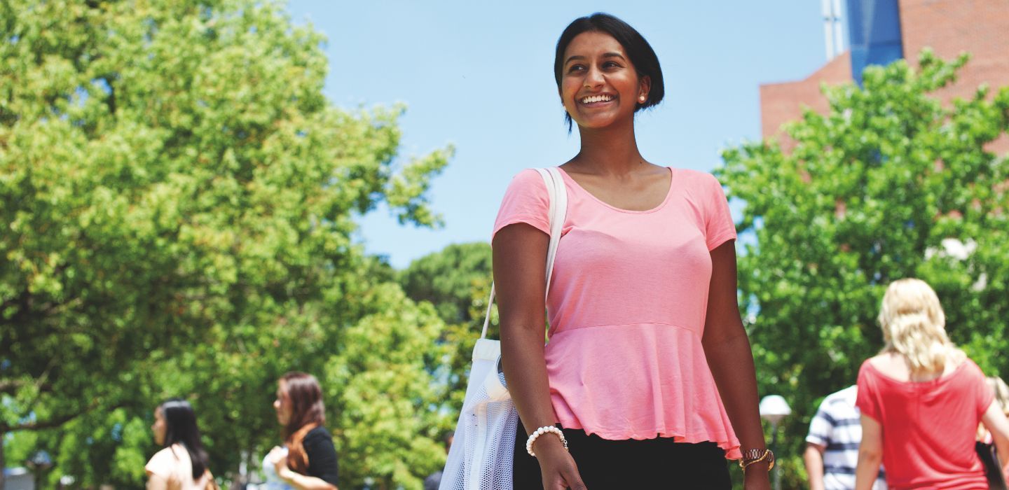 Campus female walking outside