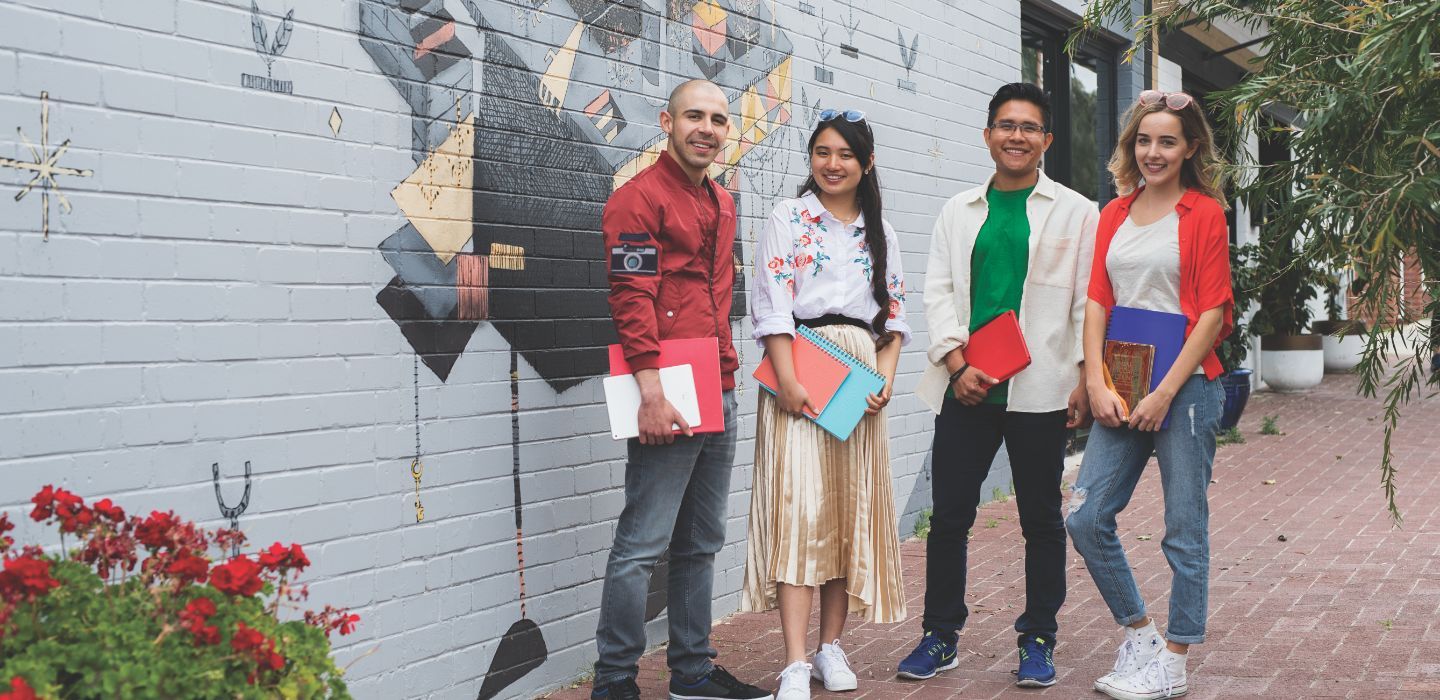 Campus group holding books
