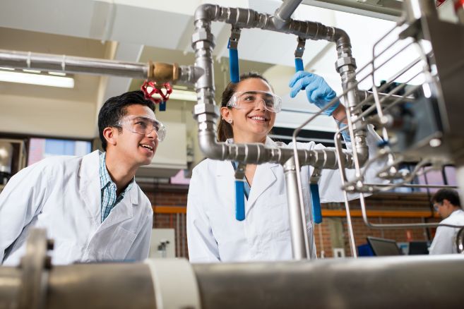 Campus male and female experiment in science class