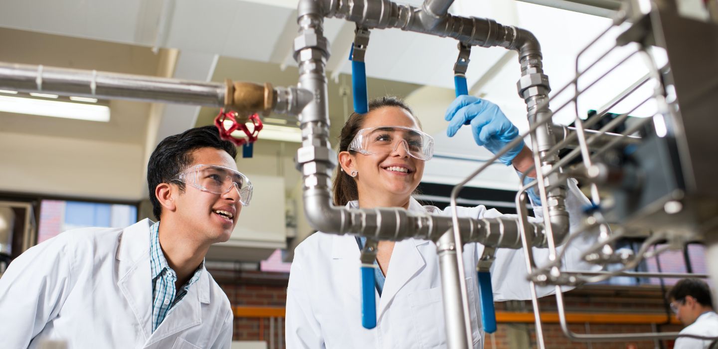 Campus male and female experiment in science class