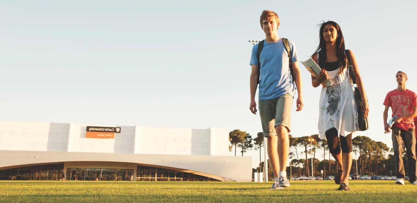 Campus male and female walking