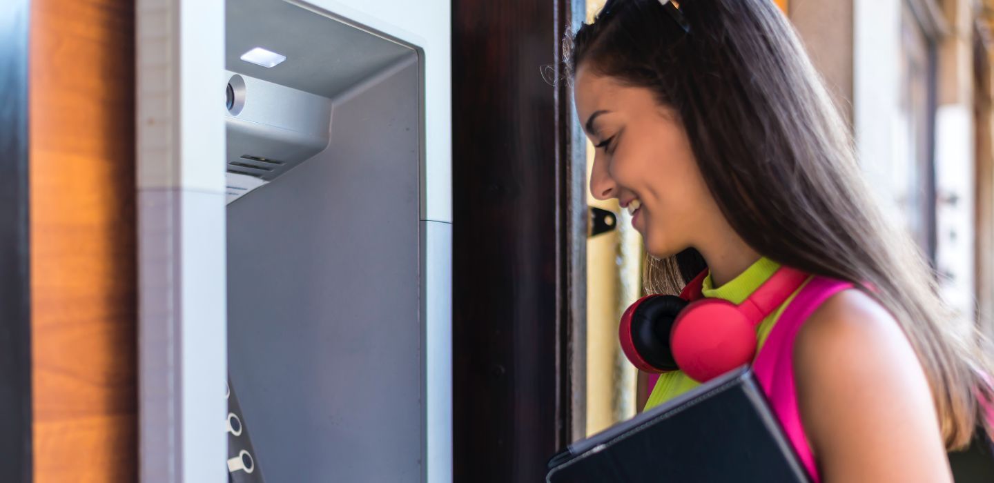 Off campus female using ATM
