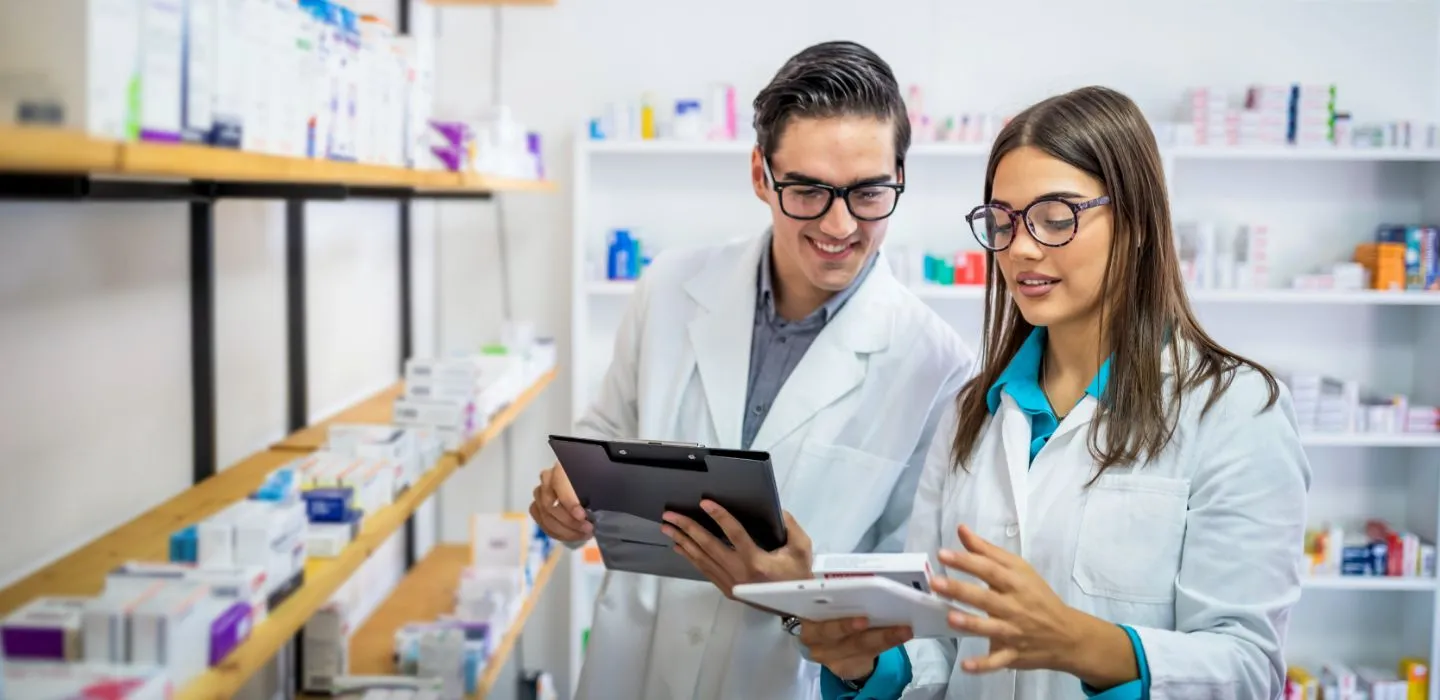 Off campus male and female in pharmacy store