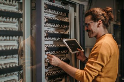 Off campus male working on server