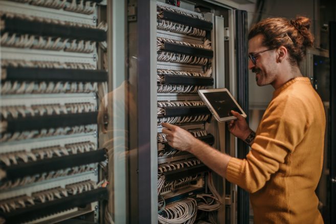 Off campus male working on server